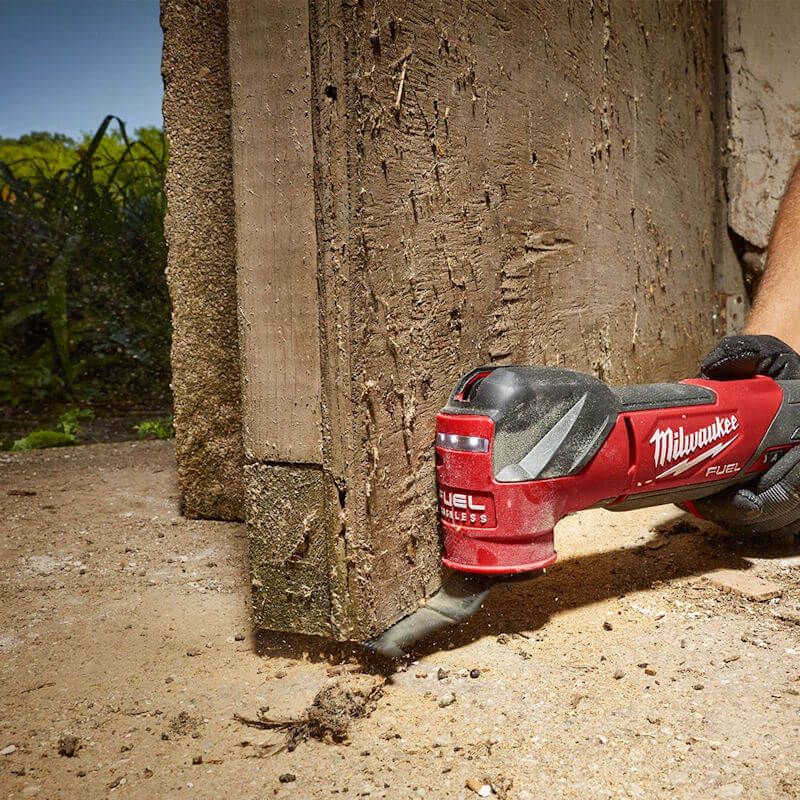 Milwaukee M18 FUEL Multi-Tool in use cutting timber